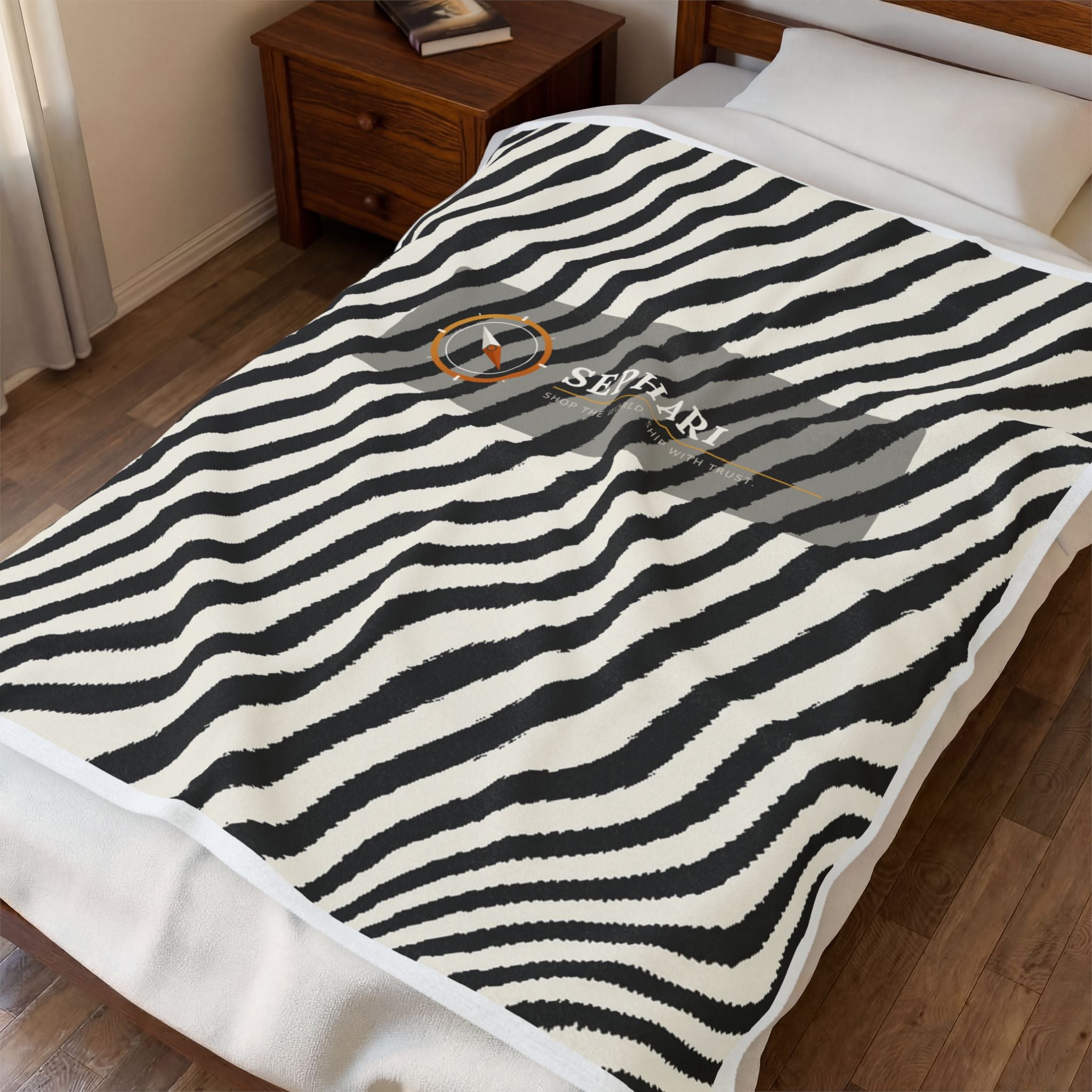 Zebra stripe cozy throw blanket draped over furniture in a living room setting